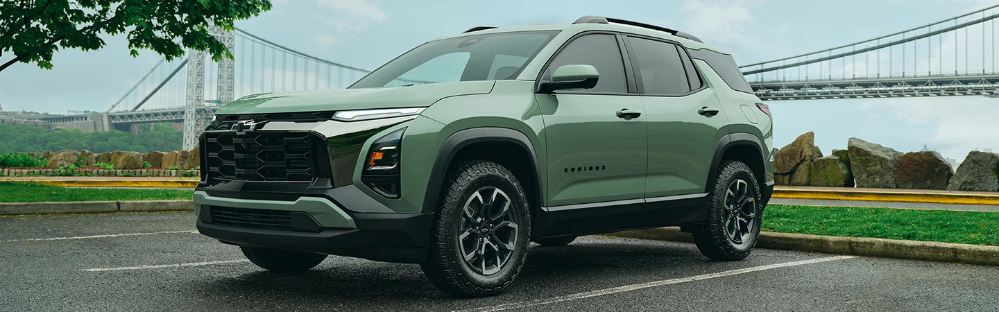 2026 Chevrolet Equinox parked in front of a bridge