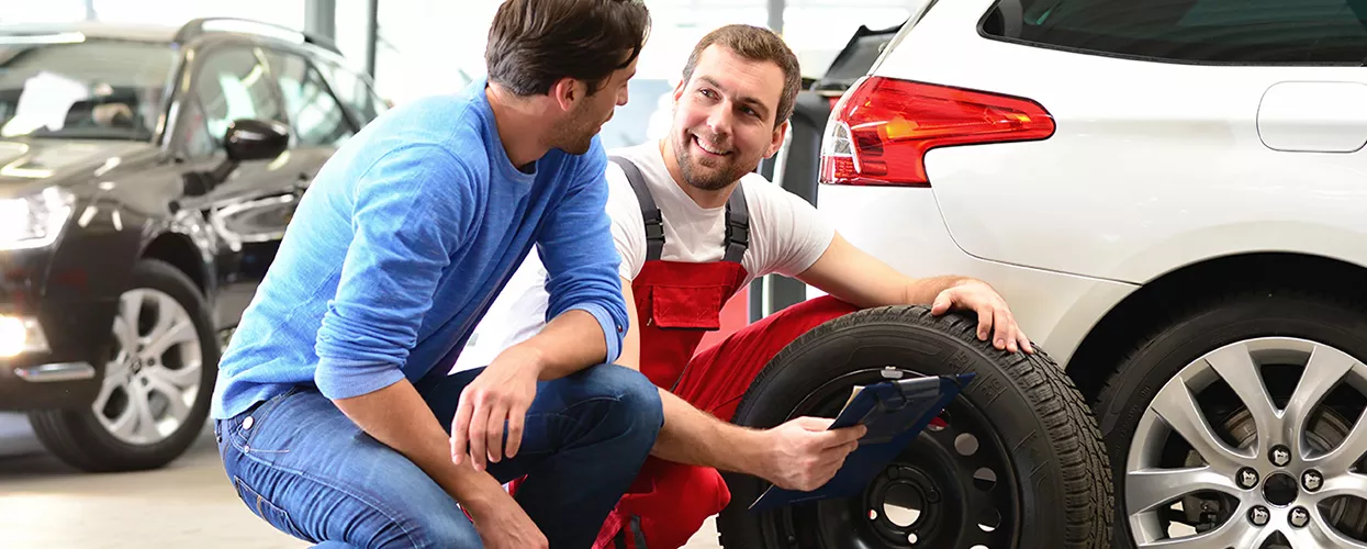 Technician performing service on a Honda at Honda of Gainesville