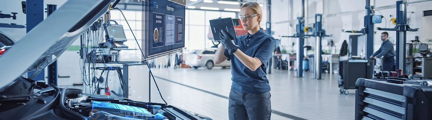 tech working on engine