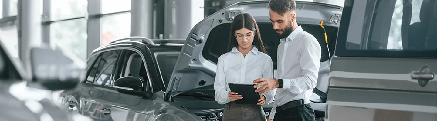 buyer discussing cars with salesperson