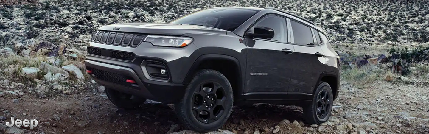 2023 Jeep Compass vs. HR-V Side front in black colour