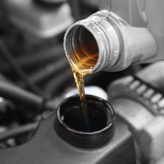 Ford Oil Change | Oil being poured into the engine