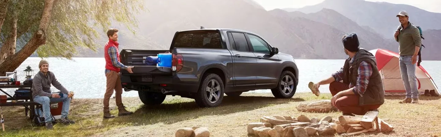 2024 Honda Ridgeline vs Ford Ranger silvercolor backview