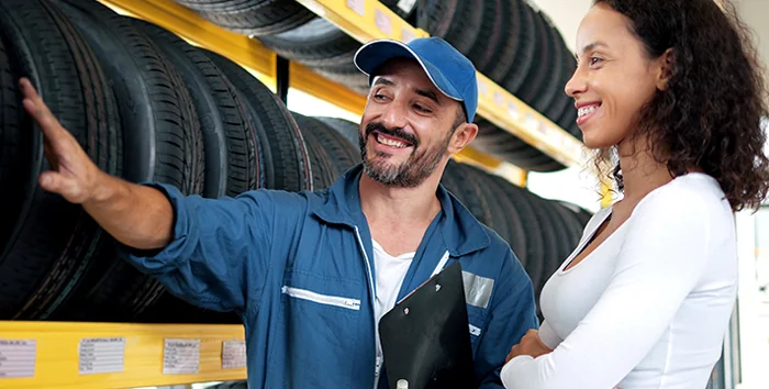 Service tech showing customer selection of tires