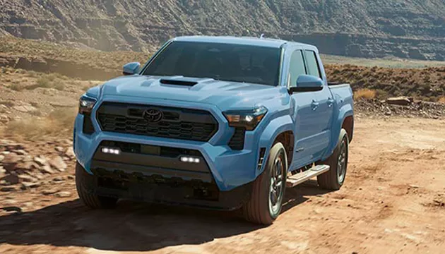 light blue Toyota Truck offroad at Bill Penney Toyota in Huntsville, AL