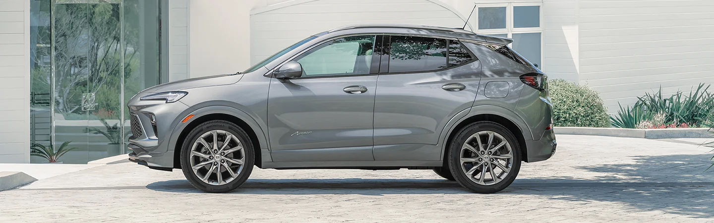 Side view of a parked 2025 Buick Encore GX in a driveway