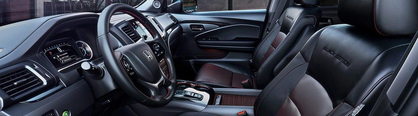 2022 Honda Pilot view of interior dashboard technology and front seats
