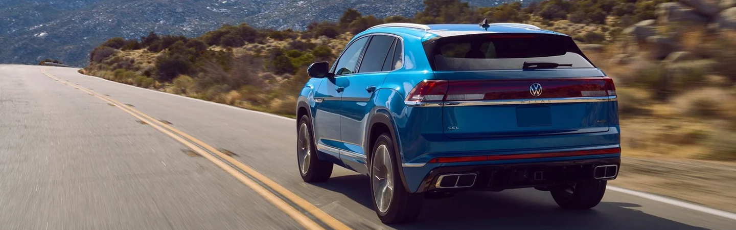 2024 Volkswagen Atlas Cross Sport Specs blue color and back view 