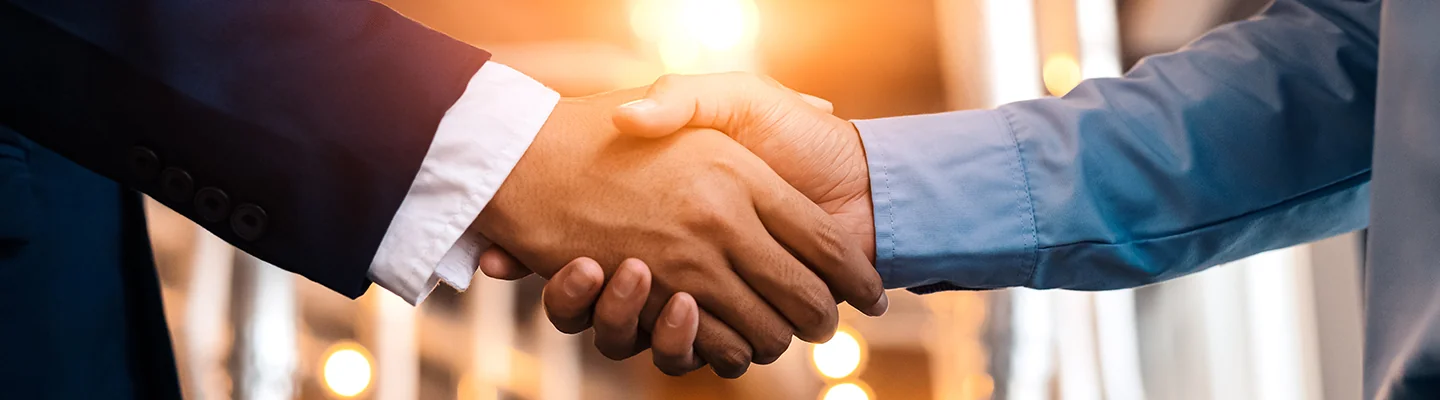 Two people shaking hands