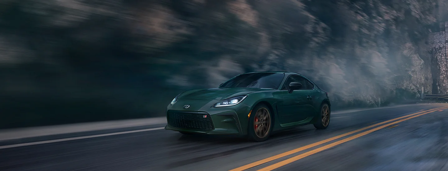 2025 Toyota GR86 driving on a mountain road