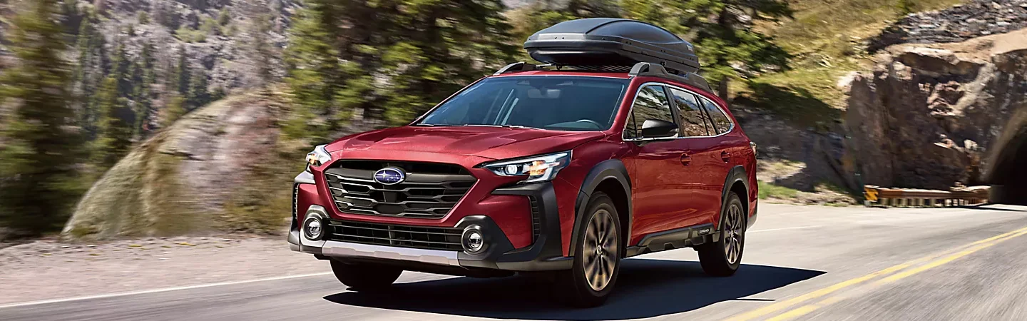 red 2025 Subaru Outback with kayak on rack