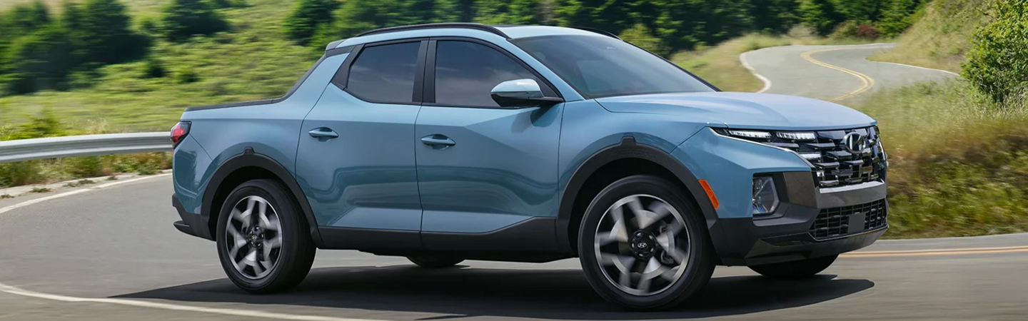 2024 Hyundai Santa Cruz side front in blue colour