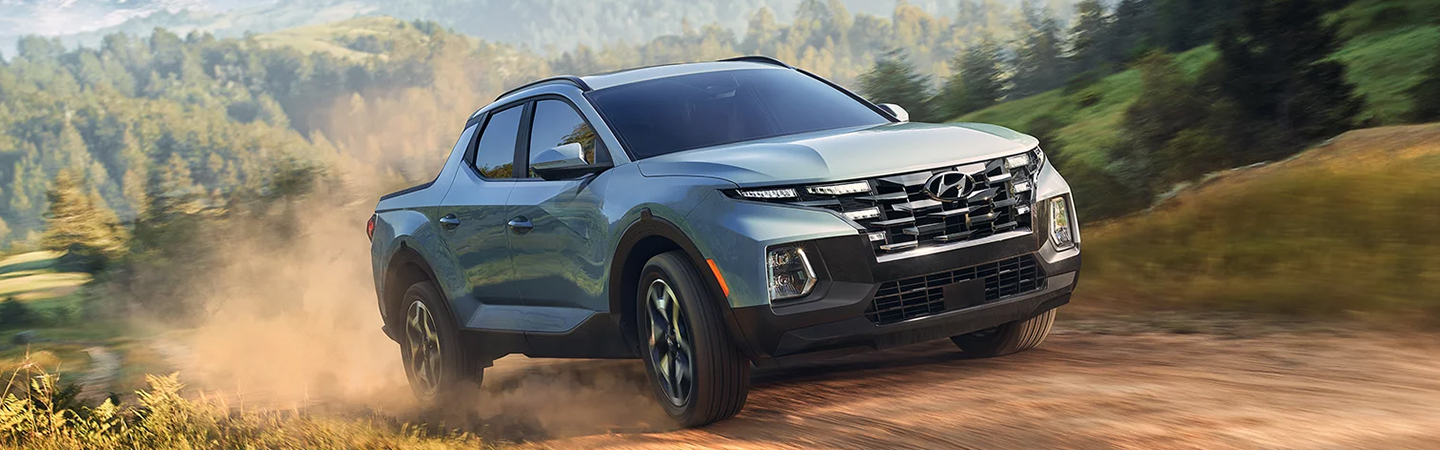 2024 Hyundai Santa Cruz side front in blue colour