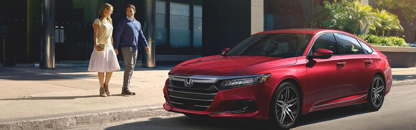 2022 Honda Accord parked in city two people approaching car