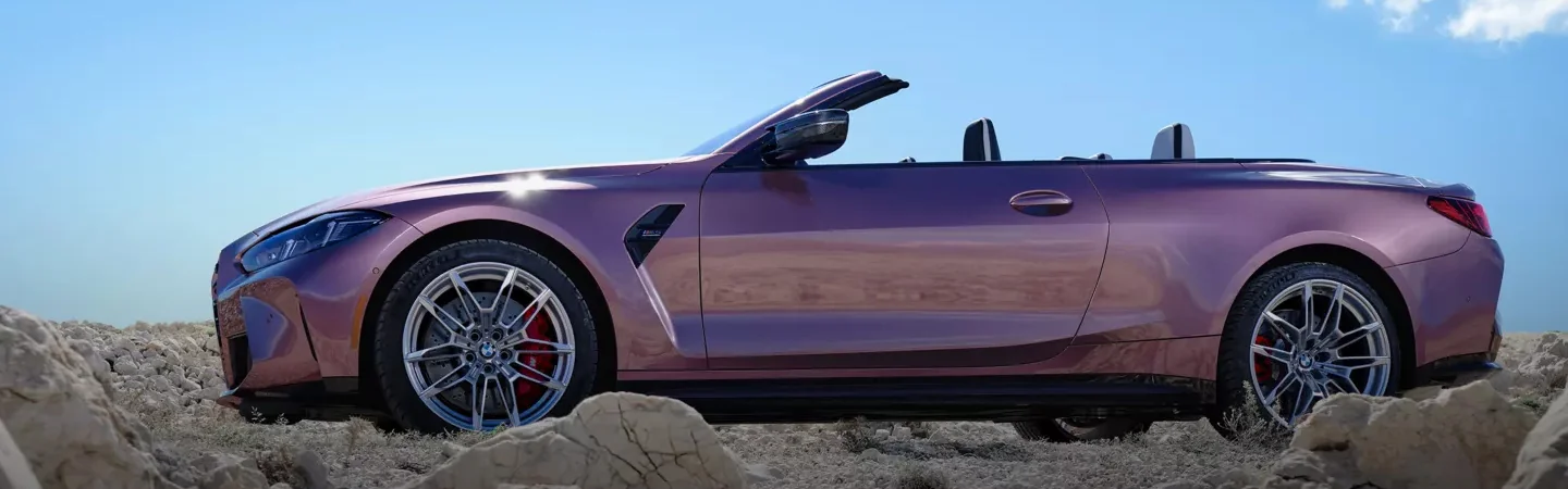 2025 BMW 4 Series Coupe side front on purpel