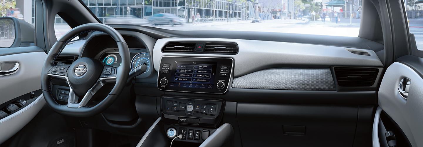 Interior view of the front seat of a 2022 Nissan Leaf