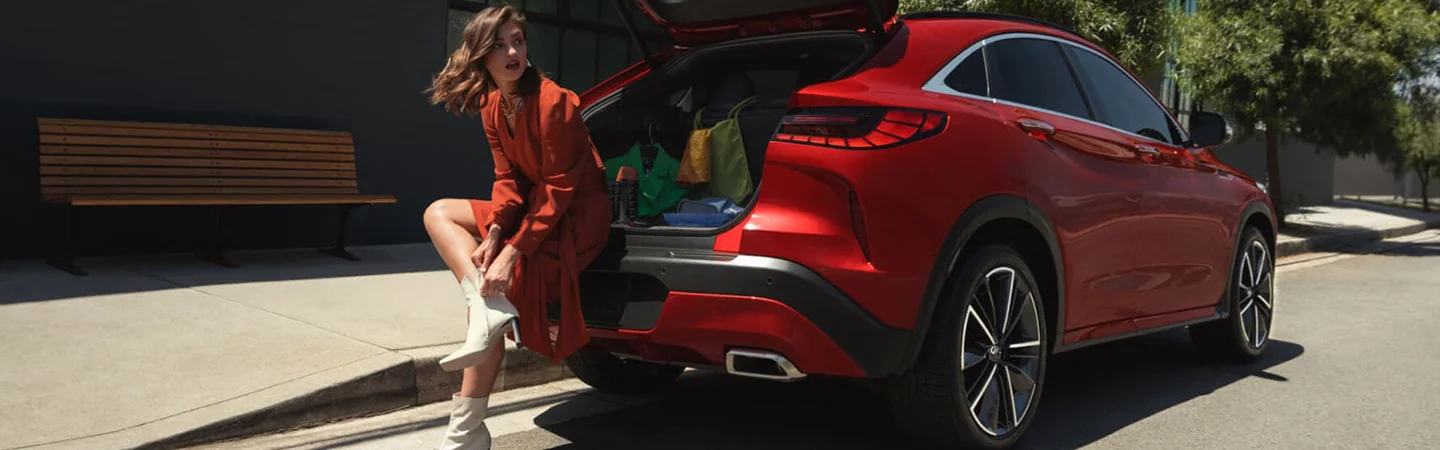 INFINITI QX55 tailgate open with woman