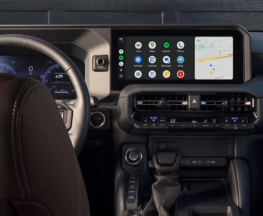 Interior view of the dachboard and tech in a 2027 Toyota Land Cruiser