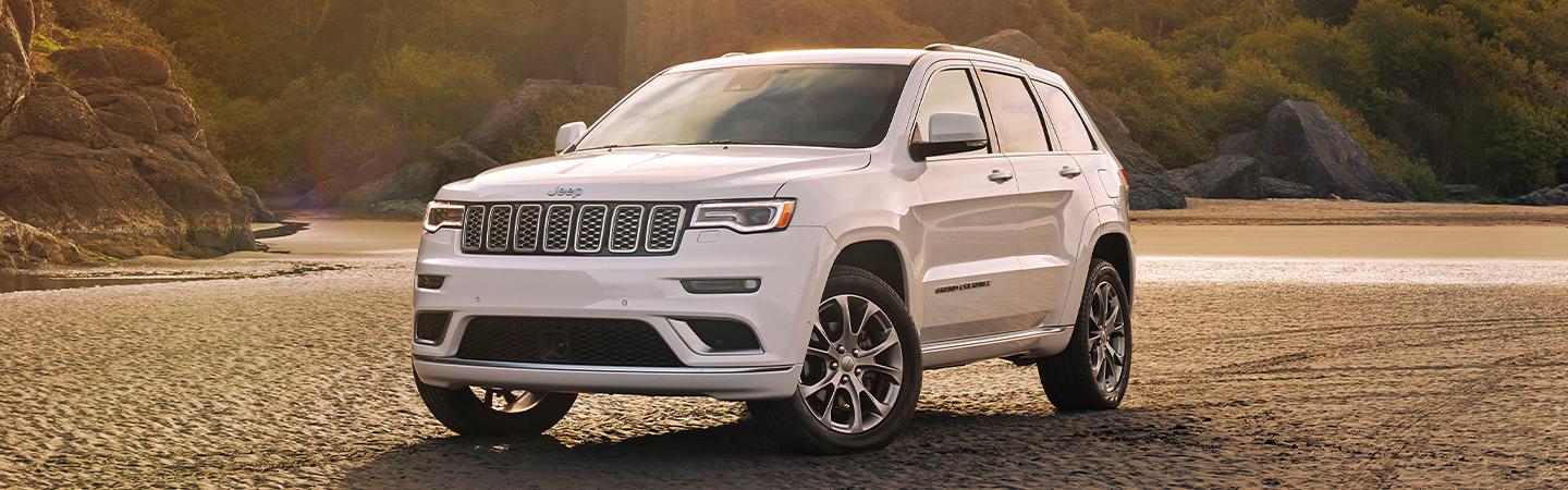 A White 2021 Jeep Grand Cherokee L parked