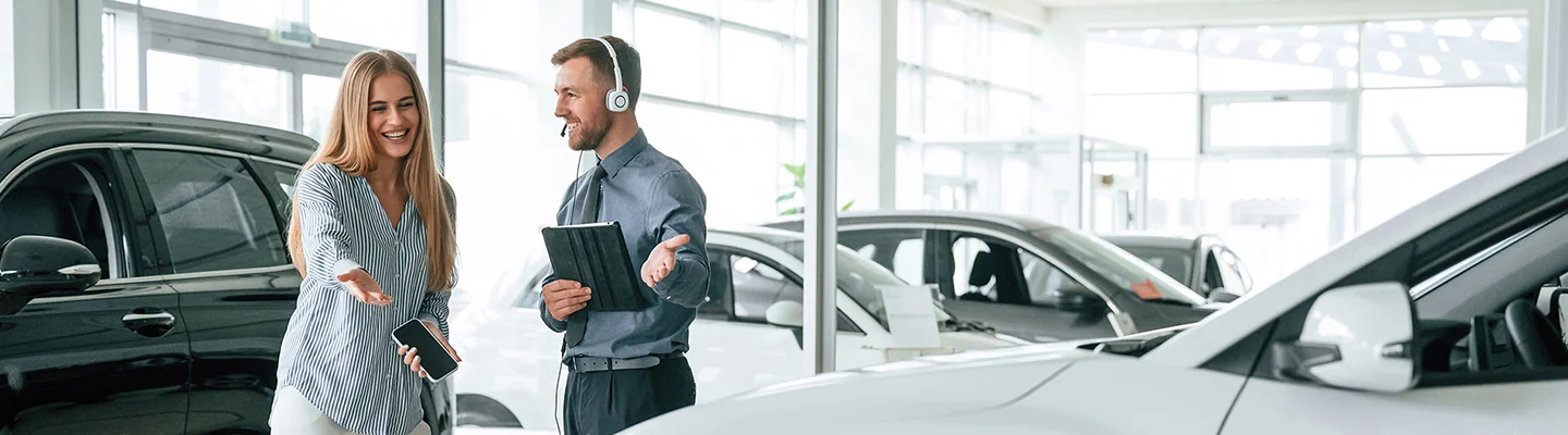 Sales person helping customer