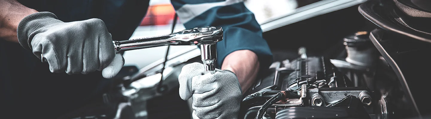 tech repairing engine