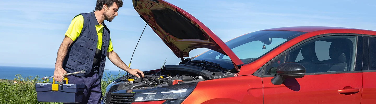 Mobile service tech checking out the engine