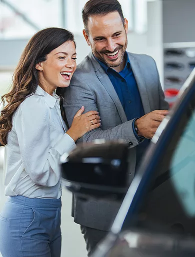 Couple shopping for a replacement vehicle