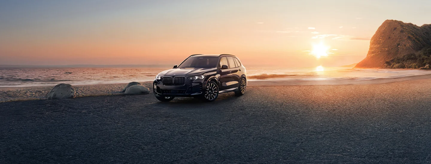 2026 BMW X5 and the sunrise on beach