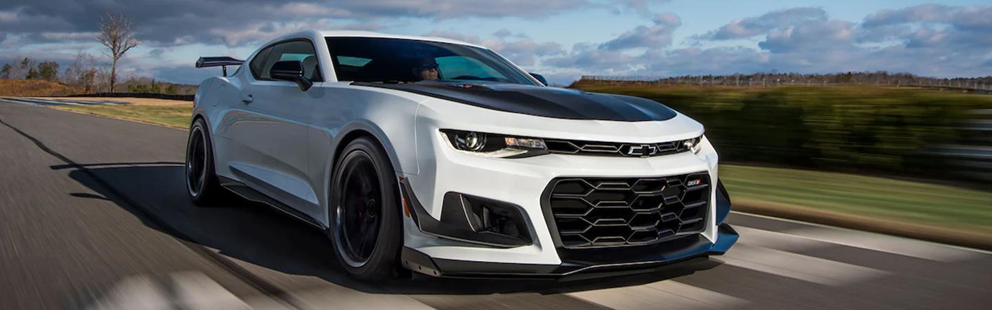 White 2022 Chevy Camaro front view in motion