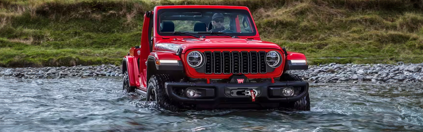 2024-Wrangler-4xe front side in red  colour