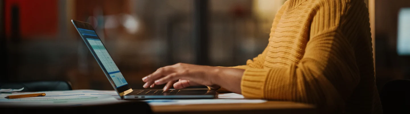 typing on laptop