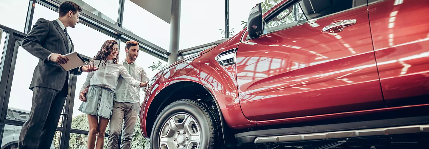 sales rep showing cars