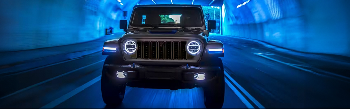 2024 Jeep Wrangler vs Ford Bronco silver frontview