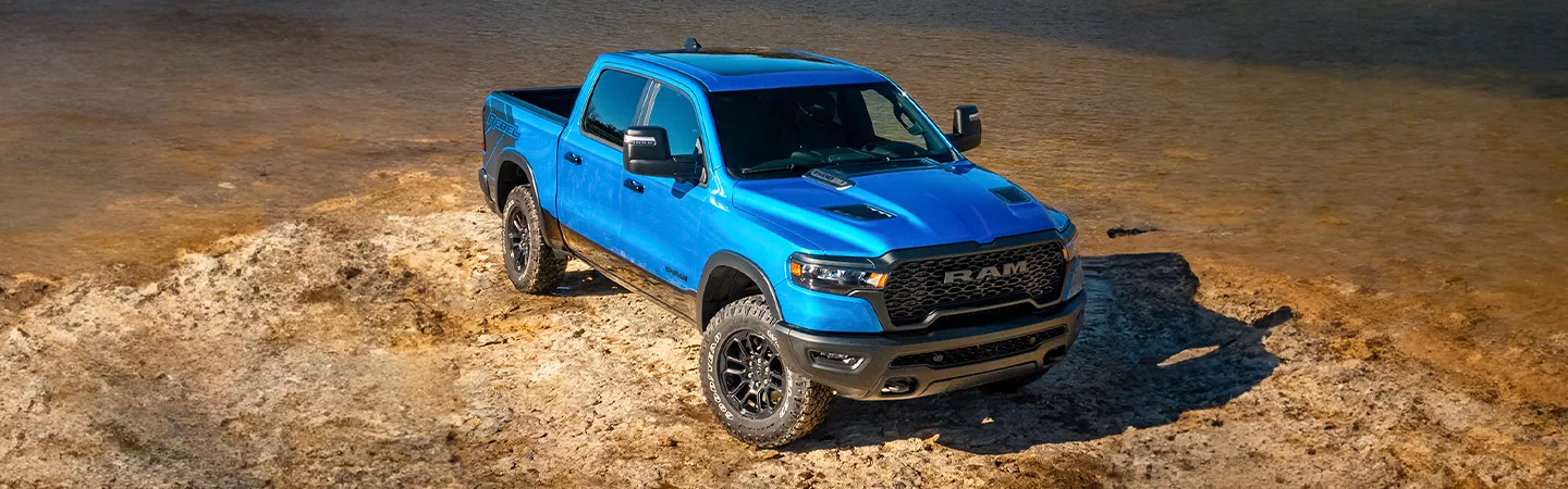 2026 RAM 1500 parked on a desert hill