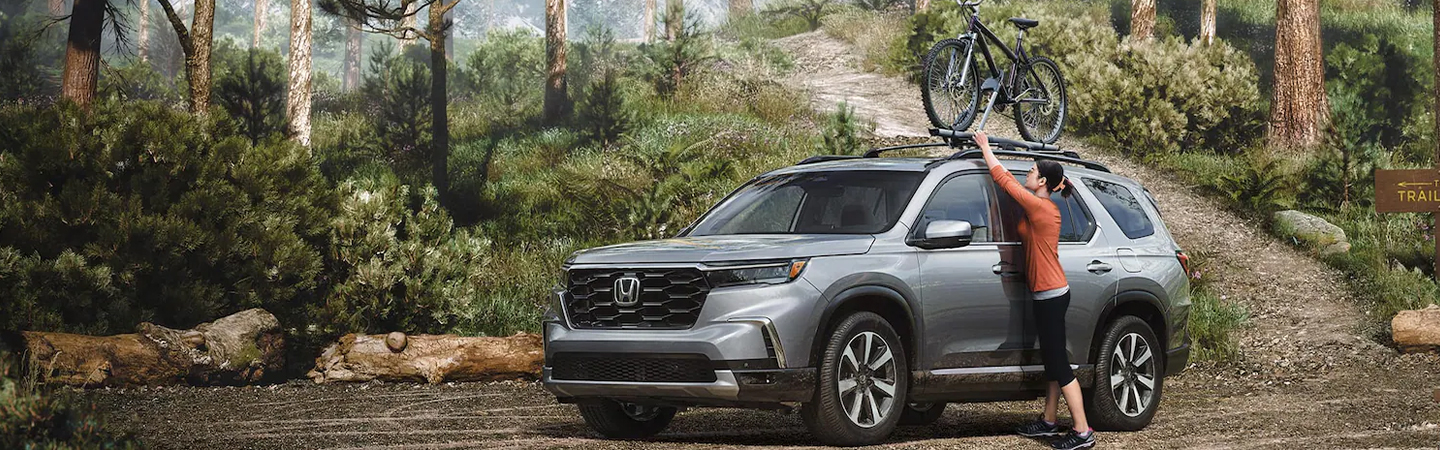 2024 Honda Pilot Specs side front view in silver colour