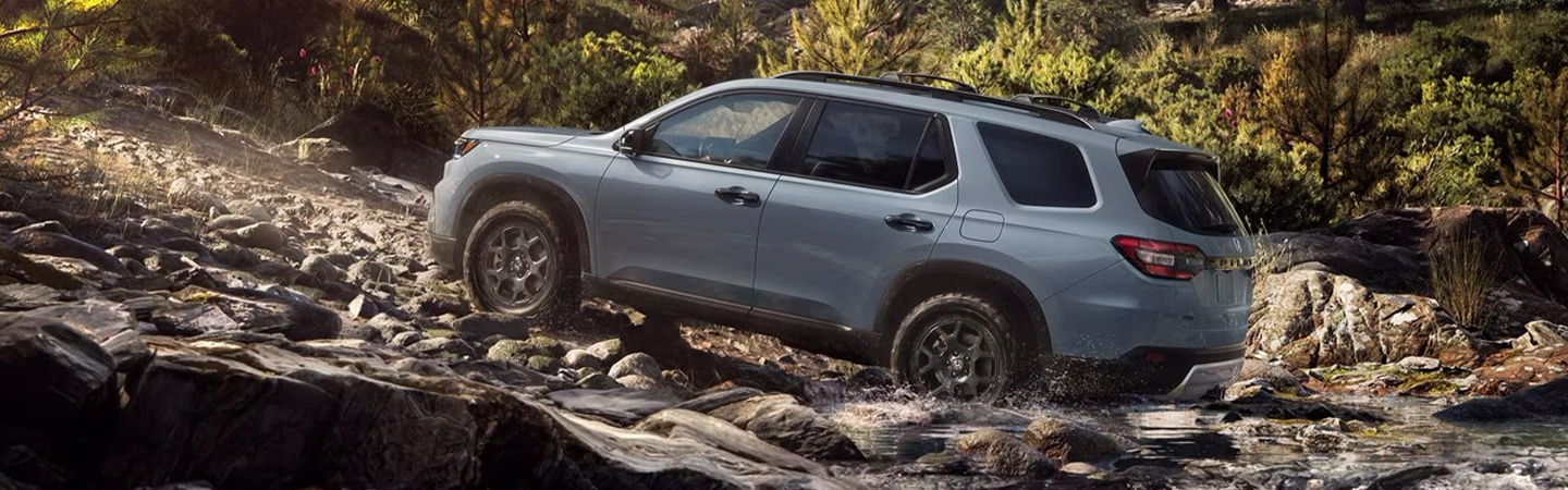 2024 Honda Pilot Specs side front view in silver colour