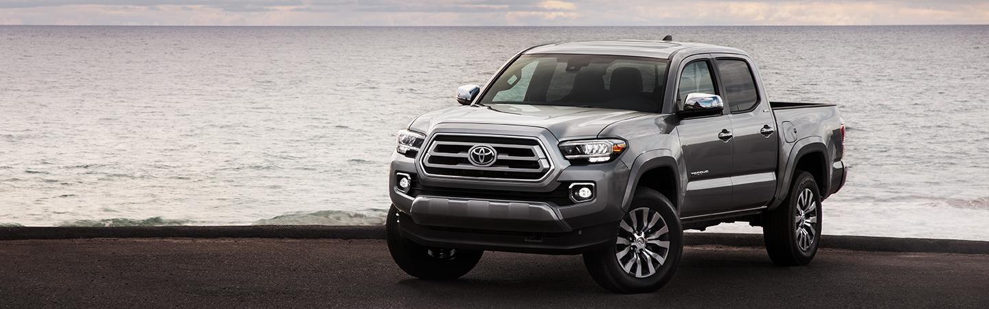 Gray Toyota Tacoma Parked in Shore