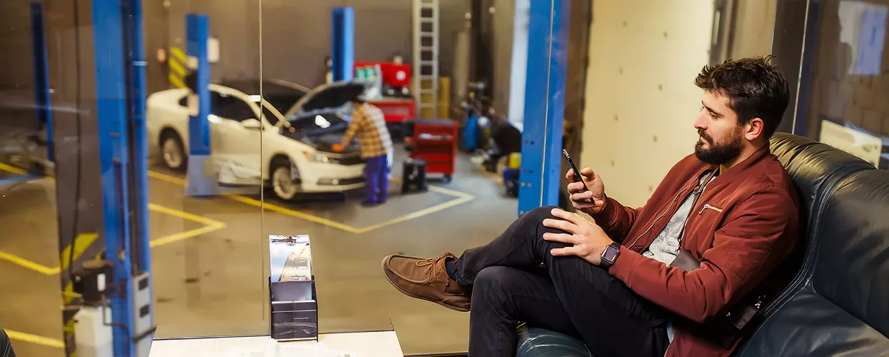 Customer lounging as his car gets serviced