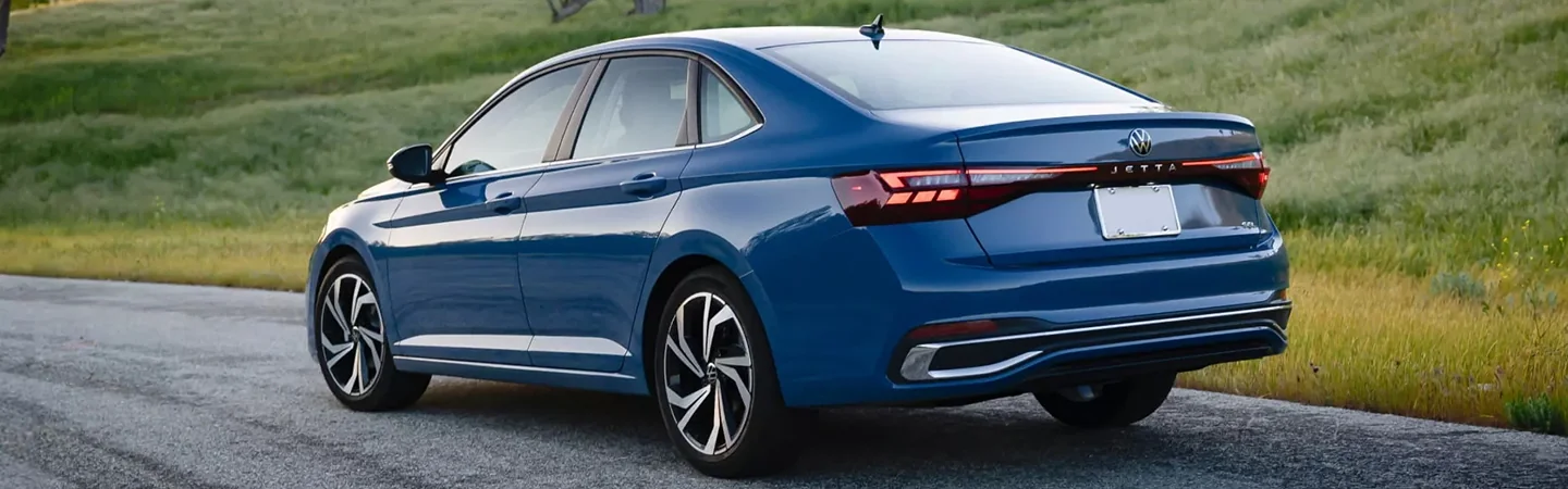 rear view of a blue 2024 Volkswagen Jetta
