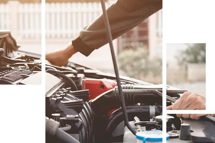 A car being repaired by a technician