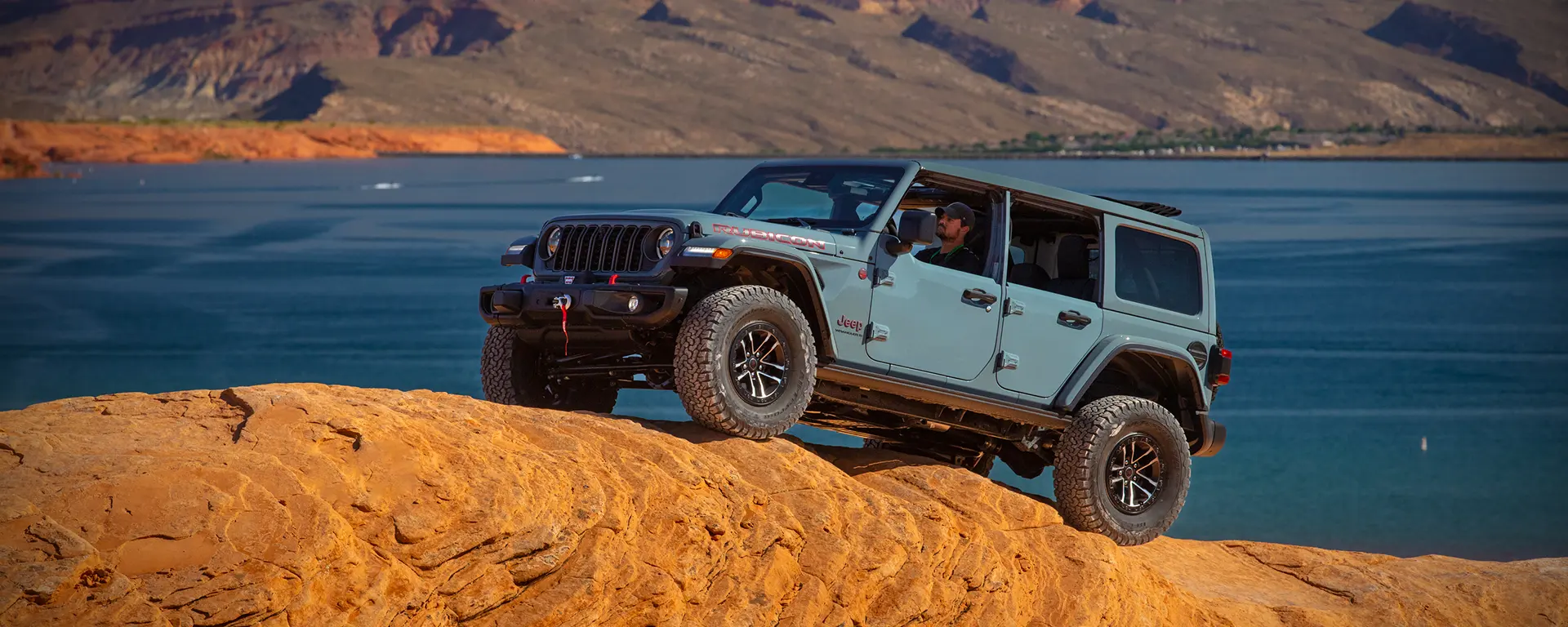 in desert with 2026 Jeep Wrangler