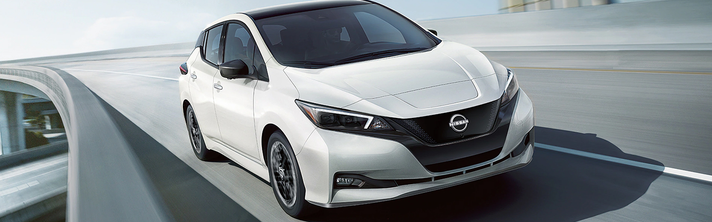 The 2024 Nissan LEAF side front in white colour 