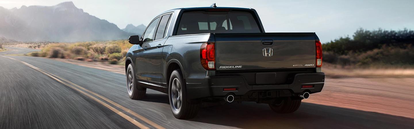 2022 Honda Ridgeline in motion rear view
