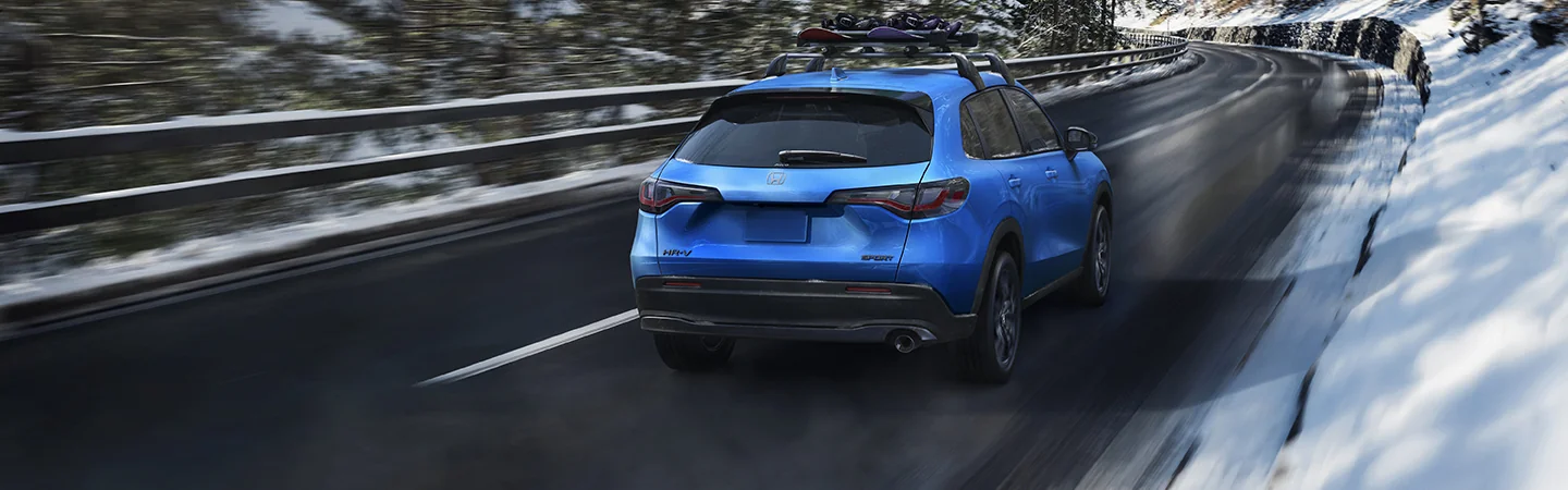 2026 Honda HR-V driving on a highway in winter
