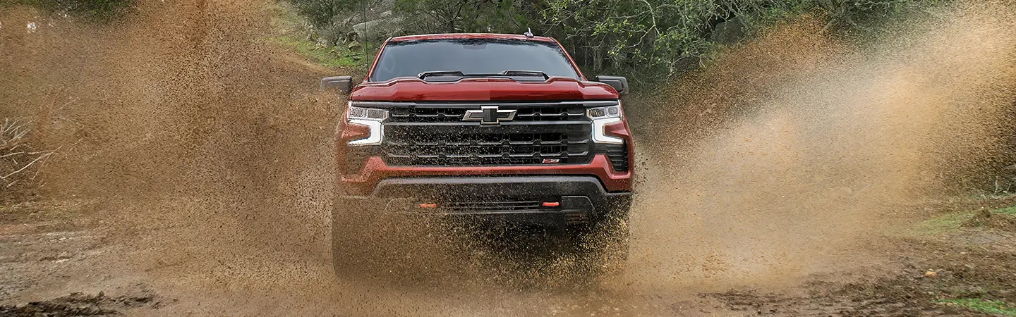 2024 Chevrolet Silverado vs Ford F-150 side view and color grey