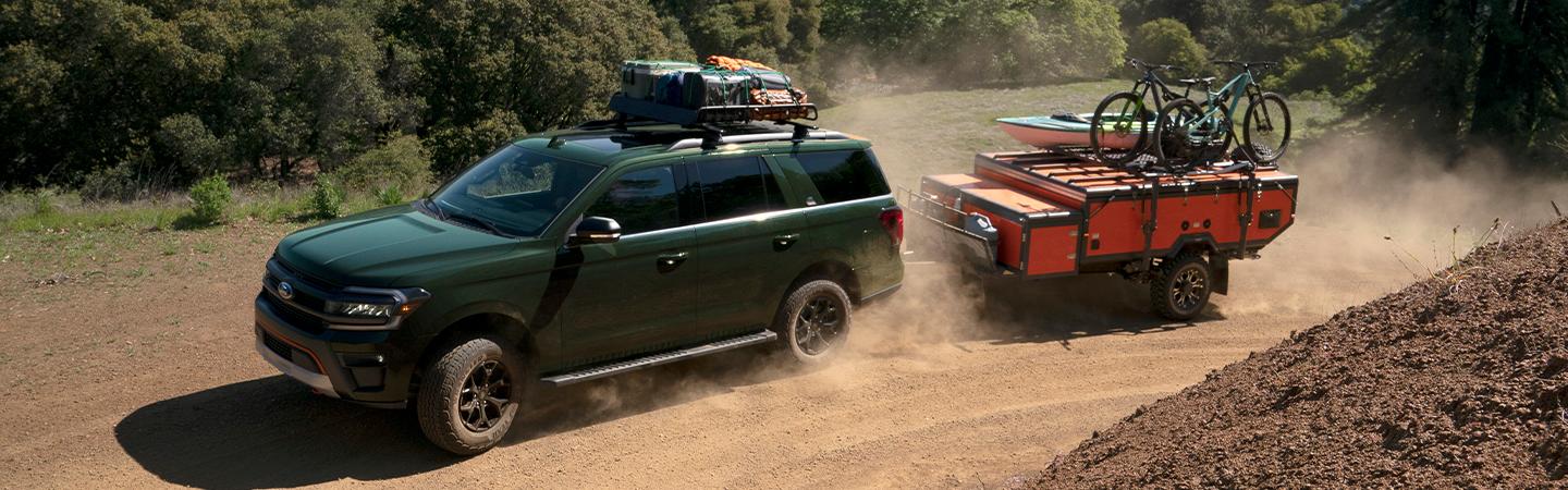 2022 Ford Expedition off road towing trailer with kayak and bike on it