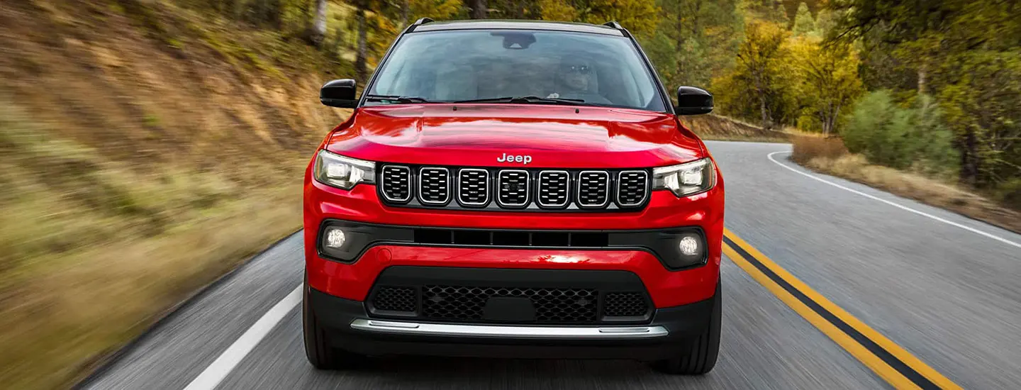 Side by side photos of a 2025 Jeep Compass and a Toyota RAV4