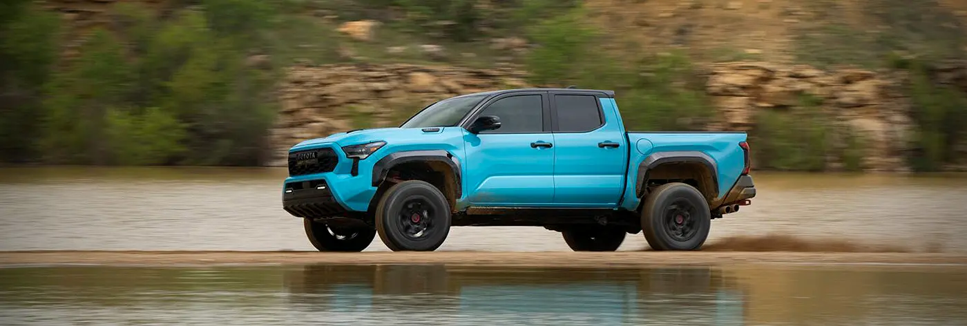profile of 2026 Blue Toyota Tacoma