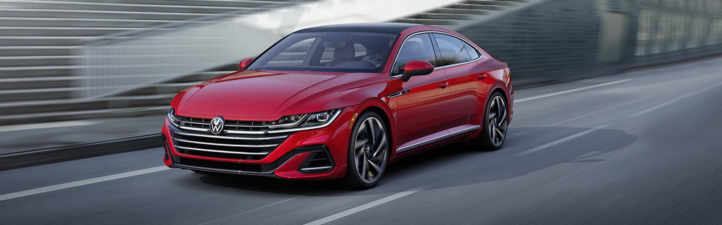 Red 2021 Volkswagen Arteon in motio