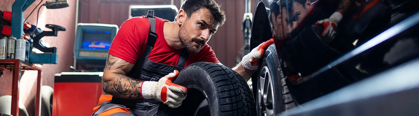 Service technician working on a Honda